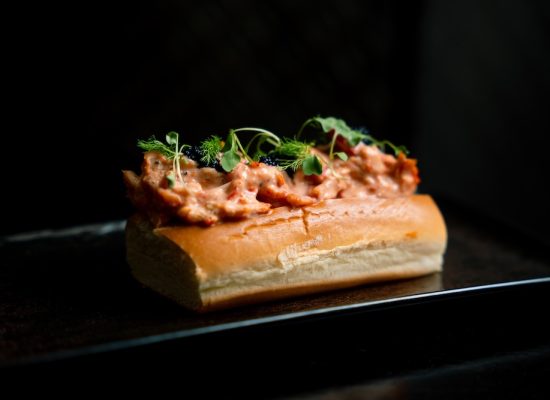 a sandwich with a topping on top