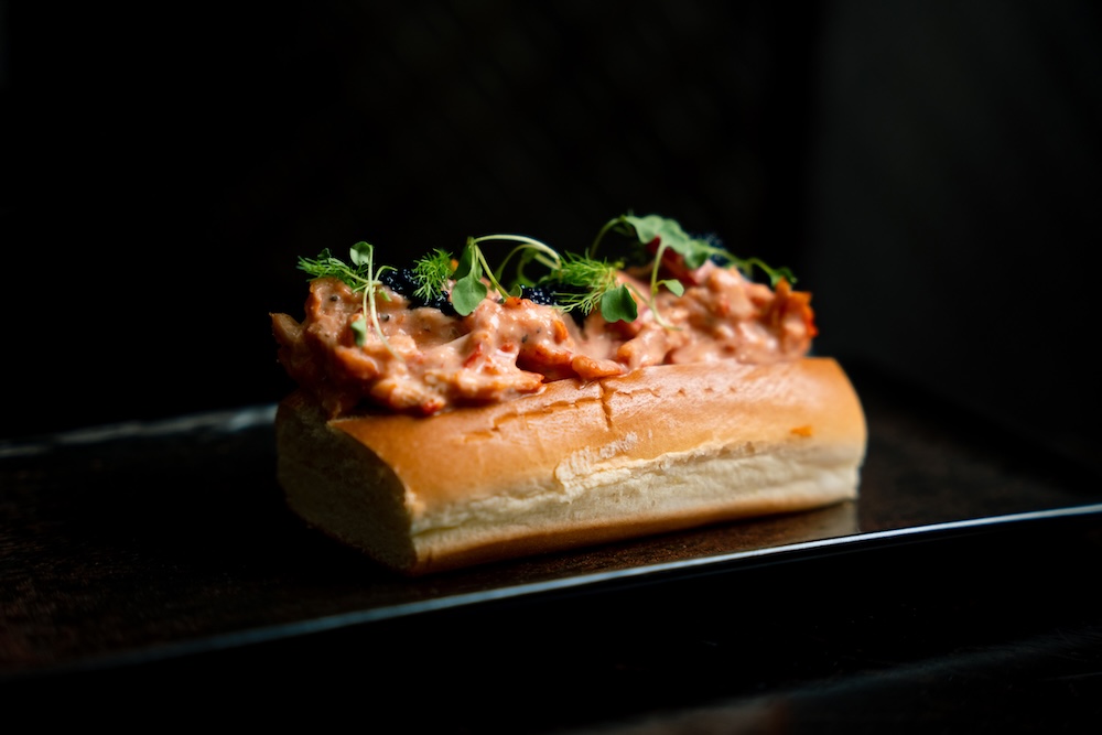 a sandwich with a topping on top